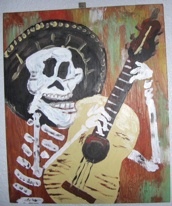 I painted this on 14" x 18" half inch plywood with acrylics. It is a modified copy of poster for Dia de los Muertos Arts Festival 11/1/12